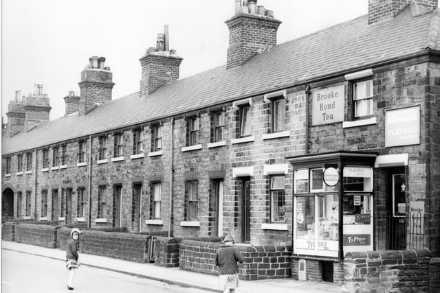 Springfield View, which consisted of a row of terraced houses on Victoria Road. To the right are the premises of F. Cardwell, General Store. Signs in the window and at the front of the property include 'Brooke Bond Tea', 'Capstan', 'Typhoo Tea' and 'Players'. Pictured in April 1967.