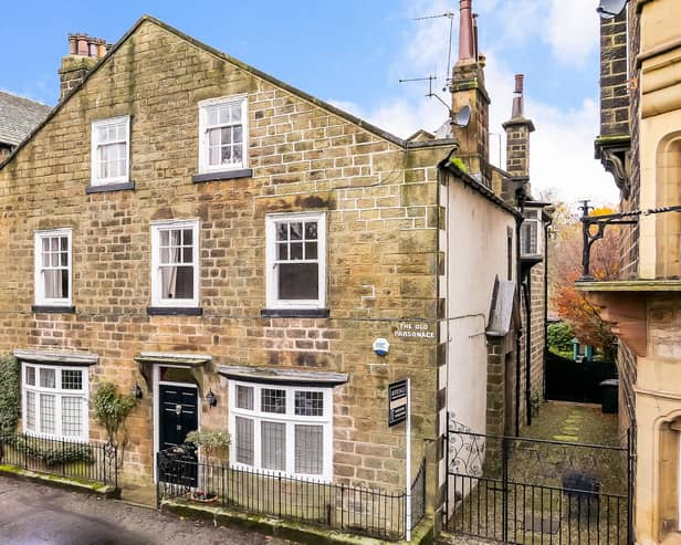 The Grade ll Listed Old Parsonage is a two-bedroom, ground floor apartment with established gardens that have Yorkshire stone patios, and a summer house.