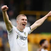 WOLVERHAMPTON, ENGLAND - MARCH 18: Rasmus Kristensen of Leeds United celebrates following victory in the Premier League match between Wolverhampton Wanderers and Leeds United at Molineux on March 18, 2023 in Wolverhampton, England.(Photo by Shaun Botterill/Getty Images)