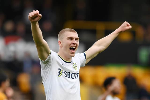 WOLVERHAMPTON, ENGLAND - MARCH 18: Rasmus Kristensen of Leeds United celebrates following victory in the Premier League match between Wolverhampton Wanderers and Leeds United at Molineux on March 18, 2023 in Wolverhampton, England.(Photo by Shaun Botterill/Getty Images)
