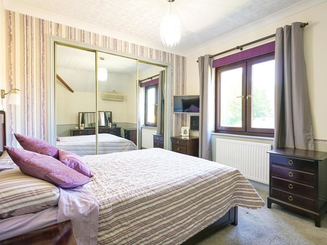 To the first floor are two double bedrooms; the master completed with fitted wardrobes.