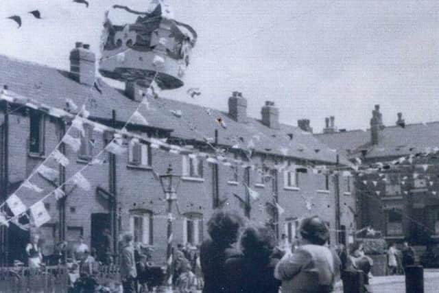 Photo taken on June 2, 1953 which shows bunting across the street, and a giant crown, above Copperfield Avenue, off Cross Green Lane, during celebrations for the coronation of Queen Elizabeth II. Houses on Copperfield View can be seen on the right. PIC: Leeds Libraries, www.leodis.net