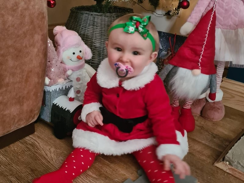 10 month old Ruby-Rae in a festive dress. Submitted by Tanya Leeman.