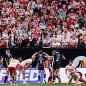 The Leeds Rhinos fan on the front row at the Hull KR end in Allegiant Stadium seems to be enjoying Harry Newman's celebration, but the Robins supporters around him appear less impressed. Picture by Alex Whitehead/SWpix.com.