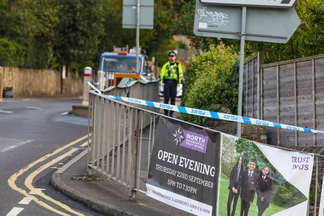 Police cordon near the scene in Woodhouse Hill, Huddersfield, where a 15-year-old boy was stabbed and later died in hospital in Leeds on Wednesday.