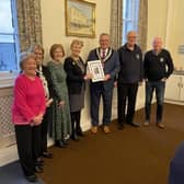 Wetherby Toilet Twinning success as a certificate is presented to the Town Council by the President of Soroptimist International of Harrogate and District, Mrs Val Hills and received by Mayor Coun Neil O’Byrne.
