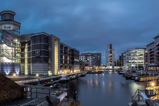 View of Leeds Dock, (Clarence Dock) at dusk with buildings lit up. Picture: Mark Graham/Adobe Stock