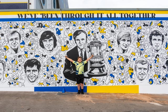 In 2017, Leeds was described as "the UK's street art capital". Pictured is the Leeds United FA Cup Mural painted on a wall near Elland Road in Beeston. Other impressive artworks Leeds is known for include Cornucopia painted near the Corn Exchange and Athena Rising near the train station.