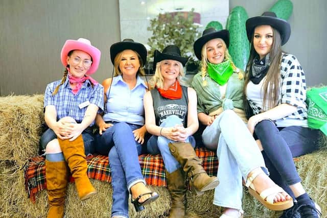 Colleagues from Cookridge Court embracing the western themed event