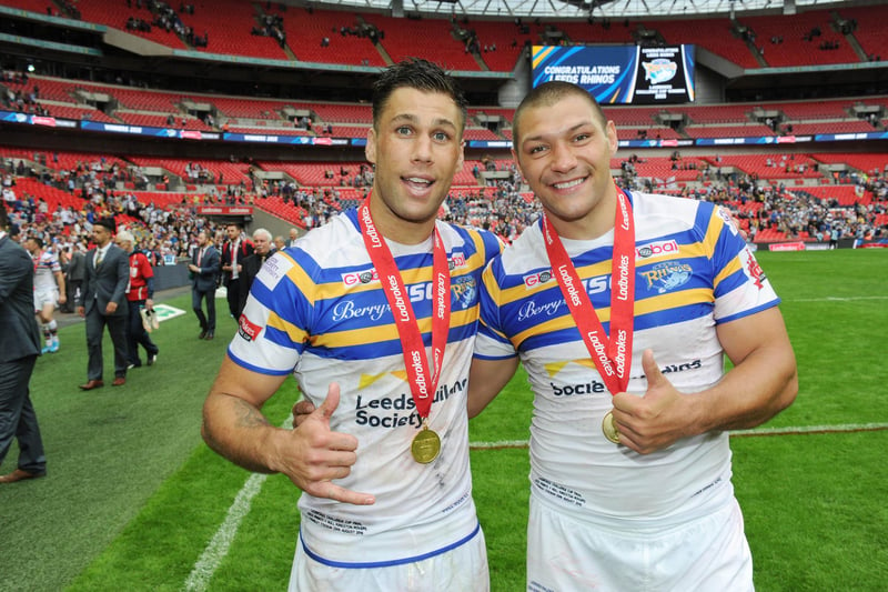 Centre Moon and winger Hall with their medals at the end of the game.