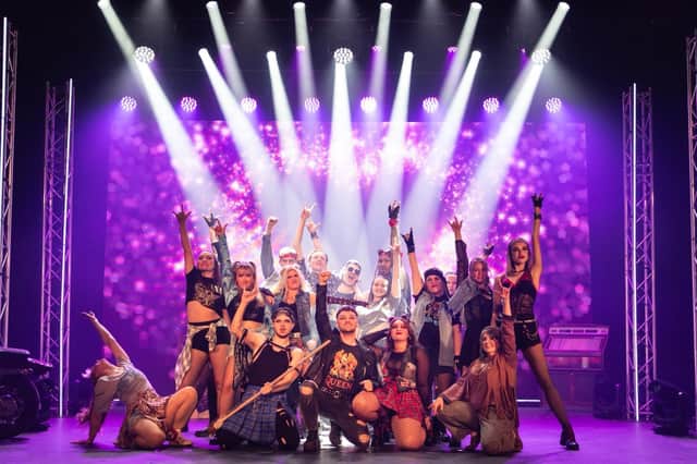 The cast of We Will Rock You.