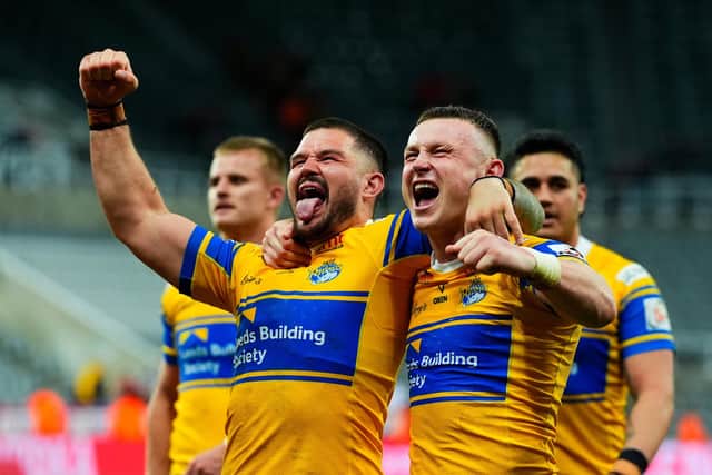 James Bentley and Harry Newman celebrate the Magic Weekend win against St Helens which fan Tom Goldsworthy reckons has given Leeds Rhinos momentum for Friday's visit of Hull FC. Picture by Olly Hassell/SWpix.com.