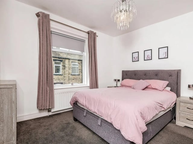 The second double bedroom also features fitted mirrored wardrobes and double glazed window to the side.
