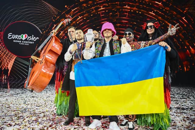 Kalush Orchestra with their trophy and Ukraine's flags after winning on behalf of Ukraine at the Eurovision Song Contest 2022. Picture: Marco Bertorello/AFP via Getty Images