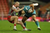 Zak Hardaker tackles his former Leeds teammate Rhyse Martin during Leigh's home win over Rhinos in Apriol. Picture by Paul Currie/SWpix.com.