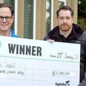 David (right) presented with his cheque