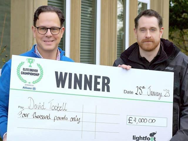 David (right) presented with his cheque