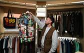 Tom Dyer at his clothing store Tomorrow Store, which stocks unisex clothing from labels across the world and products produced by Leeds artists. Photo: Jonathan Gawthorpe.