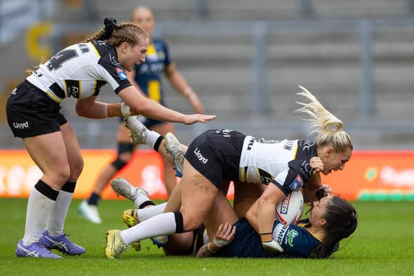 Leeds Rhinos' Ruby Enright is tackled during the Women's Super League semi-final defeat by York Valkyrie. Picture by Callum Pilkington/SWpix.com.