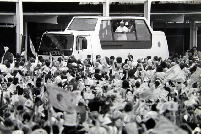 The pope waves from his custom built 'Popemobile' during his 1visit to York in May 1982.