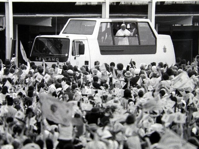 The pope waves from his custom built 'Popemobile' during his 1visit to York in May 1982.