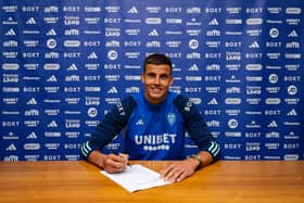 DEAL: Karl Darlow puts pen to paper with the Whites.