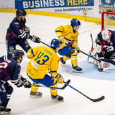 STRIKE TWO: Oli Endicott guides the puck through the legs of Peterborough goalie Hayden lavigne during Leeds Knights' 6-2 win on Saturday night. Picture: Ben Gordon/Knights Media.