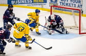 STRIKE TWO: Oli Endicott guides the puck through the legs of Peterborough goalie Hayden lavigne during Leeds Knights' 6-2 win on Saturday night. Picture: Ben Gordon/Knights Media.