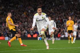 LEEDS, ENGLAND - OCTOBER 23:  Rodrigo of Leeds celebrates after scoring the equalizing goal from the penalty spot during the Premier League match between Leeds United and Wolverhampton Wanderers at Elland Road on October 23, 2021 in Leeds, England. (Photo by Stu Forster/Getty Images)