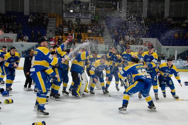 THAT WINNING FEELING@ Leeds Knights' captain Kieran Brown (right) lifts the NIHL National play-off trophy in Coventry. Picture: Blueline Photography.