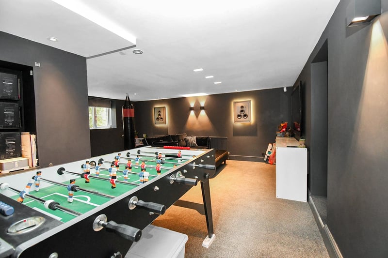 The lower ground level features an impressive games room.