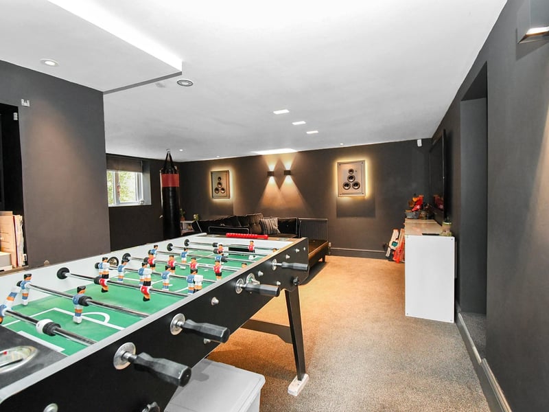 The lower ground level features an impressive games room.
