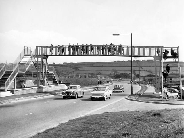 Priesthorpe School pupils use the new bridge which has been built for them by Pudsey Council so that they can safely cross the Ring Road in May 1967.