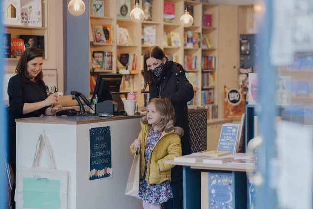 The Little Bookshop owner Cheryl Duffield is pictured here with some customers. The bookshop, located in Chapel Allerton, will be hosting Jacqueline Wilson for a book signing and Cressida Cowell for a talk this summer. Photo: Dan Burton