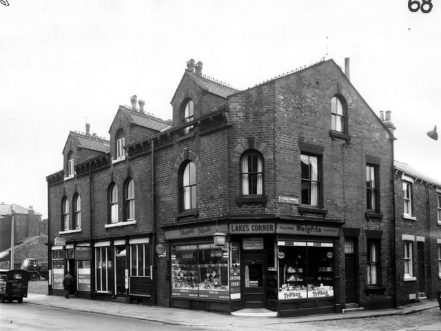 The Reliant Transport Cafe and Lakes Corner, a grocers run by Frederick Lake, on Holbeck Lane are in focus from this photo from March 1965.  Stead Street can be seen on the right edge.