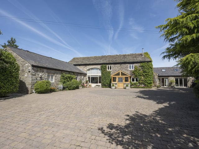 The approach to the £2.25m barn conversion that is currently for sale with Savills.