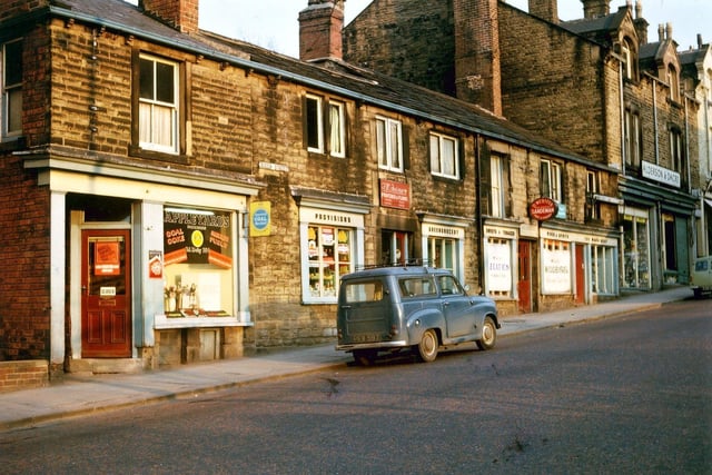 These were the oldest shops in Queen Street still standing when this photograph was taken in April 1965. Nearest to the Liberal Club is Appleyard's (formerly Middlebrook and Philpott, Coal Merchants), then comes Joiners, Green Grocery provisions, then Webster's Off-licence and a little wool shop, with the household furnishings of Alderson and Dacre joining on to the end of this old row.
