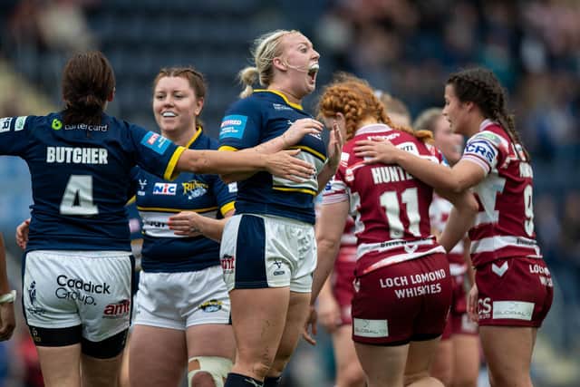 Keara Bennett, third Rhinos player from left, celebrates as the final whistle sounds in last week's Challenge Cup semi-final against Wigan. Picture by Jess Hornby/Getty Images.