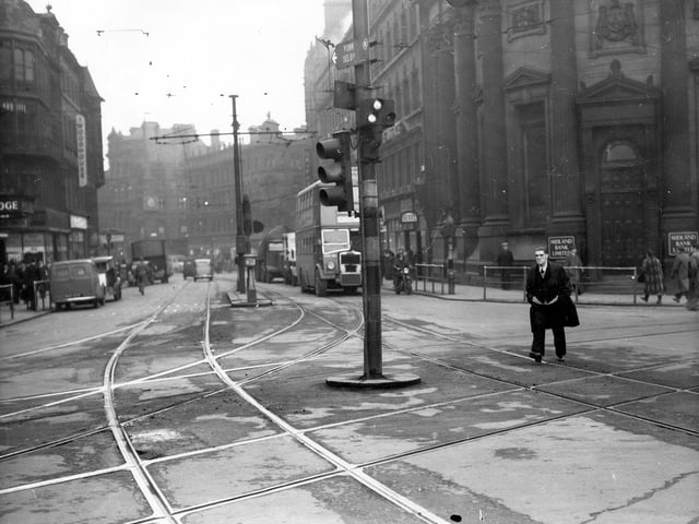 Boar Lane (centre) in January 1951 at the busy junctions with Park Row, left, and Bishopgate Street, right, with junction with Wellington Street behind the camera. Dominating the top, right-hand corner is the Midland Bank Limited, formerly the Yorkshire Banking Company, which stands on the corner of Boar Lane with Bishopgate Street.
