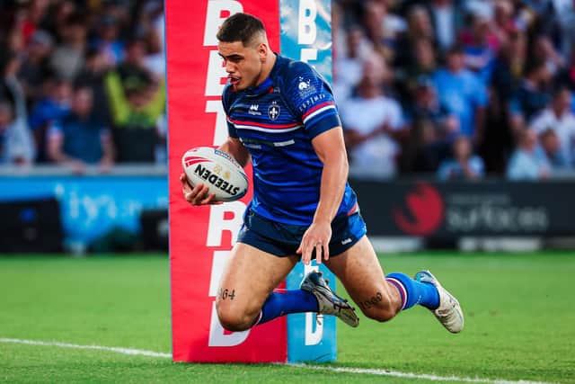 Caleb Hamlin-Uele scofres for Wakefield Trinity against Leeds Rhinos. Picture by Alex Whitehead/SWpix.com.