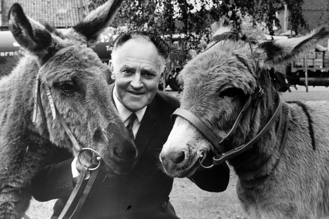 This is Max Faircliffe who was a  foreman at John Smith's Tadcaster Brewery. He is pictured with his surprise retirement presents – two donkeys.  Mr Faircliffe, who is chairman of Tadcaster Rural Council, already kept bantams, tropical fish, pigeons and a dog at his home.