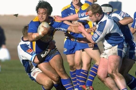 Willie Poching on the attack for Rhinos during a rare visit to Workington, for a Challenge Cup tie in 2004.