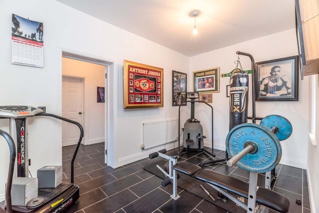 The utility room could be easily transformed into a gym.