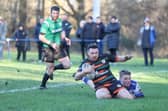 Matty Beharrell scores for Hunslet RLFC is their Challenge Cup win at Lock Lane. Picture by John Victor.