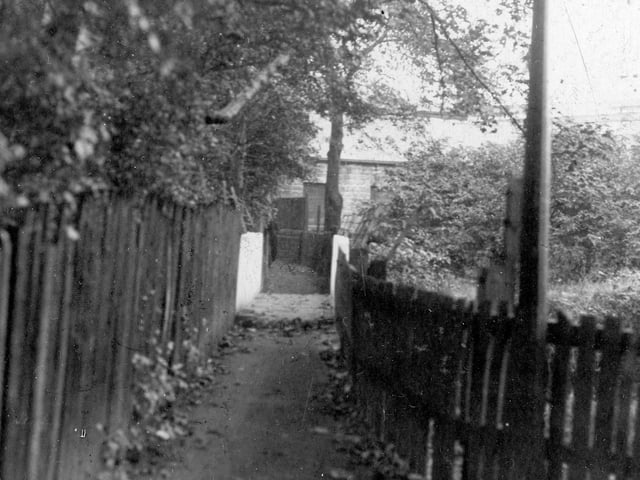 A footpath and footbridge leading from Meanwood Road to Woodhouse Ridge in October 1936.