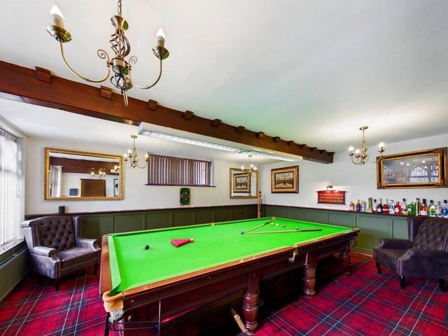 The ground floor boasts an impressive entertainment/party room complete with a snooker table, darts area, and bar — perfect for hosting.
