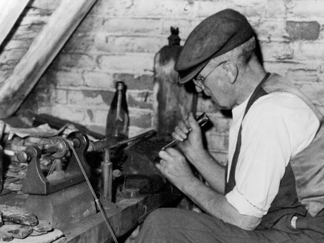 Whitby Jet craftsman William Cox at work in his attic workshop at Boulby Bank in Whitby in September 1960.