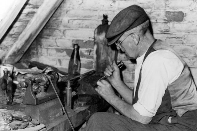 Whitby Jet craftsman William Cox at work in his attic workshop at Boulby Bank in Whitby in September 1960.