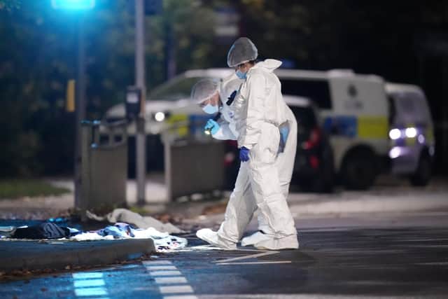 Forensic officers in Horsforth, Leeds, after the incident on Tuesday. Photo: Danny Lawson/PA Wire