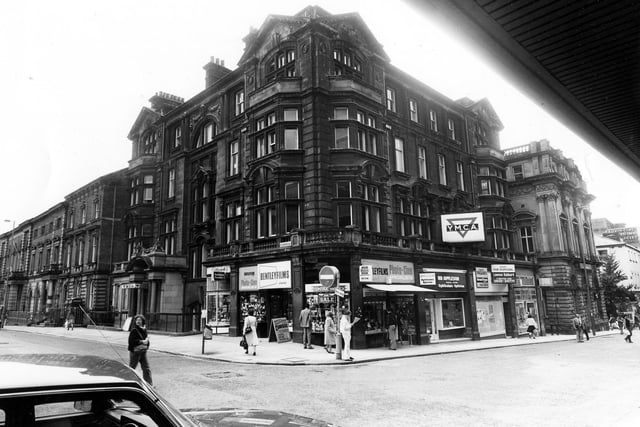 The junction of Albion Street and Albion Place, showing the YMCA building in the centre in June 1984. Shops on the ground floor of the building are Eastwood tobacconists, Bentley films photographic equipment, Raymond Appleson oticians, a vacant shop and Hunting Lambert travel agents. On the Left of the picture is the former County Court building and on the right the Britannia Building Society.